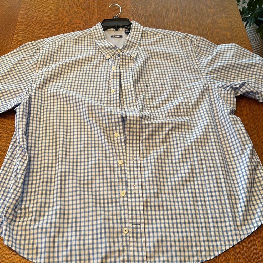 Never worn, without tags. 53% cotton, 47% polyester
